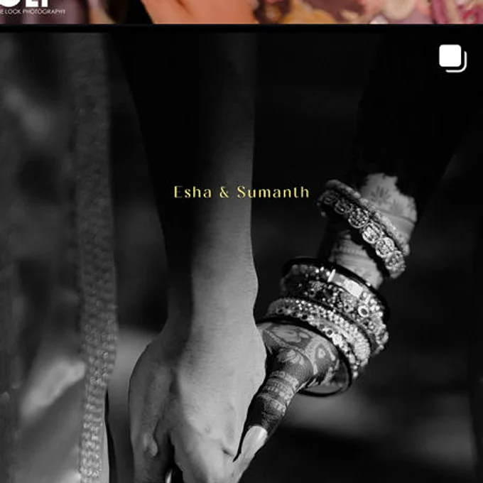 Esha and Sumanth's hands in black and white, her wrist stacked with bangles